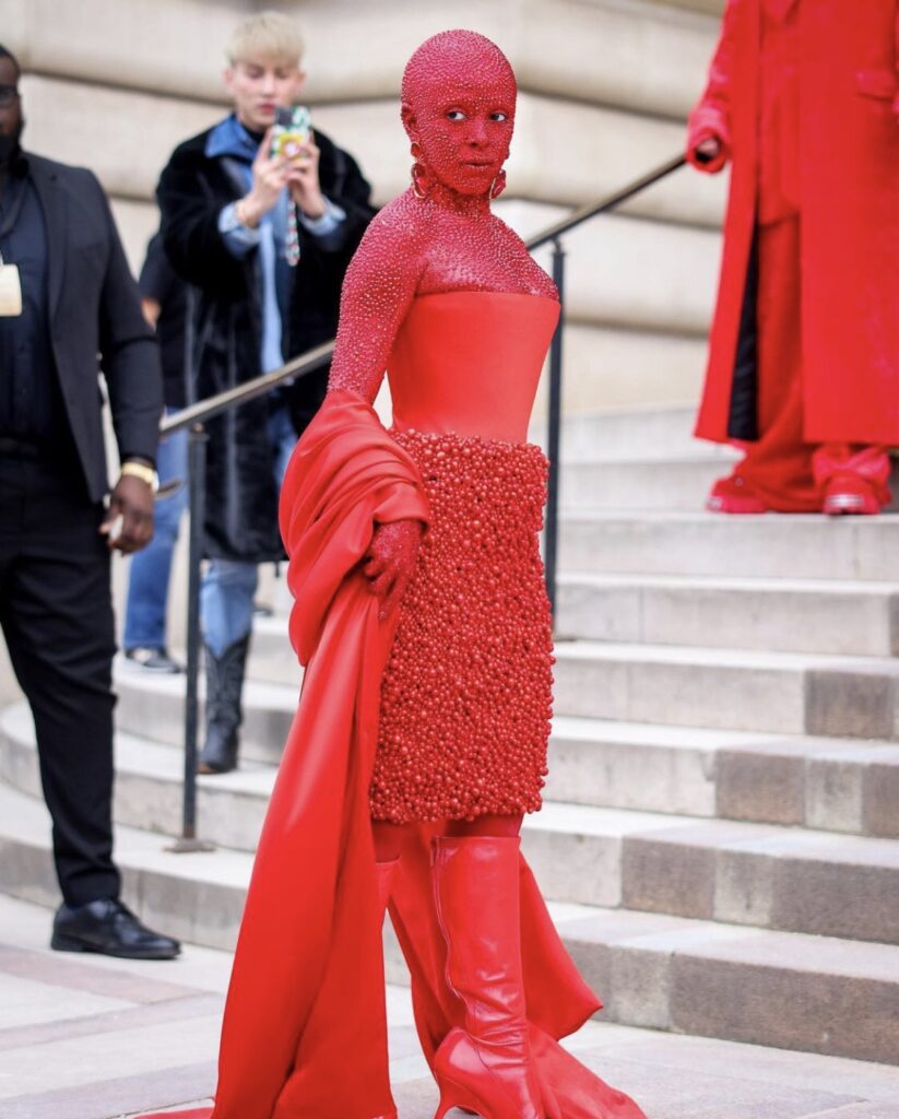 Doja Cat Sparkles in Schiaparelli at Paris Haute Couture Week in Full Red Body Paint and 30,000 Crystals