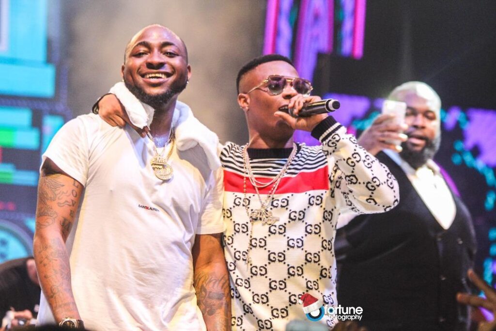 Davido and Wizkid perform at a show in 2017.